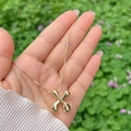 Polished 18K gold-plated balloon style 'X' initial pendant on a snake chain - Gold X