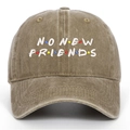 Close-up of No New Friends embroidery on vintage washed cotton baseball cap with dots - One Size / Khaki