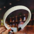 Detailed shot of white faux pearl headband with non-slip interior and protective fabric ends - S271-9 Multi-row Dense Pearl Headband