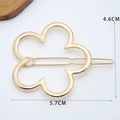 Golden flower-shaped metal hair clip with a minimalist hollow five-petal design, 5.7cm size - Flower Shape Gold