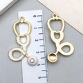 Golden stethoscope charms with white enamel and rhinestone for DIY jewelry making - Large KC Gold White Stethoscope
