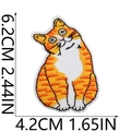 Detailed view of ginger cat embroidery patch with size measurements 6.2cm by 4.2cm - Orange Tabby Cat Side Sitting Style