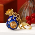 Golden fortune bag keychain with blue enamel, sparkling rhinestones and Lucky character - Round Blue Fortune Pouch