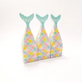 Three mermaid tail candy boxes with pastel scales and green glitter fin details - Blue Mermaid Tail Candy Box