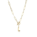 Detail of gold letter L pendant on paperclip chain with a stylish toggle clasp - Letter L