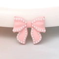 Pink bow resin accessory with white pearl trim for DIY jewelry and shoe charms - Pink