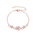 Rose gold bracelet with three hollow flower charms and sparkling white zircon stones - Three Hollow Flowers (S521)