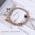 Gray-green Nordic curtain tieback featuring matte wooden beads and magnetic buckle closure - Grey Green