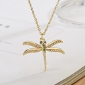 Detail view of 18K gold plated dragonfly pendant necklace with green and white crystals - Green Gemstone Dragonfly Style (23181)