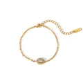 Détail du bracelet en acier inoxydable plaqué or 18K avec breloque ovale et extension - Style Zirconium Oval (YYB023107)