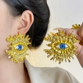 Detail of vintage sun-shaped evil eye ring with gold finish and blue enamel eye detail - Sun Evil Eye Gold Earrings