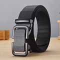 Men's black nylon tactical belt featuring a matte metal automatic buckle on wooden table - P0140B Style / Black