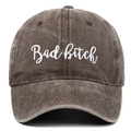 Detail showing white script embroidery on a washed cotton vintage baseball cap - Coffee