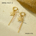 Detail of gold starfish earrings with white pearls and pink bead chains on sand stone - Starfish Pearl Pink Beaded Tassel Earrings