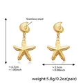 Detailed view of gold starfish and seashell drop earrings with size and weight specs - Conch Starfish Combo (F576) / Gold