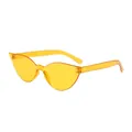 Translucent yellow cat eye sunglasses with irregular frame and modern aesthetic - Night Vision Yellow
