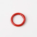 Detail view of a 23mm red lacquered metal spring ring buckle for keychains and bags - Red (Outer Diameter 23mm)