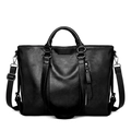 Detailed close-up of high-quality black PU leather texture and silver hardware on a tote bag - Standard Single Bag / Black