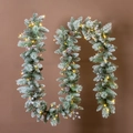 Detail of flocked Christmas garland with pine cones, purple berries and warm LED lights - 1.8M Bare Garland With LED Lights