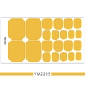 Flat lay of YMZ295 solid yellow toenail stickers in various sizes on a white background - YMZ295-Bright Yellow