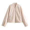 Detail van de lichtroze damesjas met metalen rits en maatlabel S in de nekopening - S / Beige