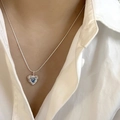 Elegant silver heart necklace with blue sapphire gemstone on a delicate chain - Blue Zirconia Heart (XL2481)