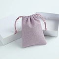 Sparkling purple drawstring jewelry pouch with glitter finish on white background - 5x7cm / Purple