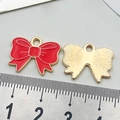 DIY bow-shaped alloy charm in red enamel and gold finish with a ruler for size reference - Red Decorative Bowknot