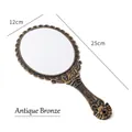 Specchio a mano in bronzo antico con motivi floreali barocchi e stile retrò, lungo 25cm - Bronzo Antico