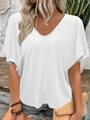 Detail of loose fit white V-neck T-shirt showing soft fabric texture and batwing sleeves - S / Tops / White