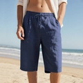 Close-up of blue linen casual shorts with drawstring elastic waist on beach setting - S / Navy Blue