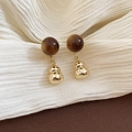 Detail of vintage gold gourd earrings with round tiger eye stones on brown fabric - Gold Gourd with Brown Bead (925 Silver Pin)