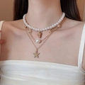Detail view of multi-layer ocean necklace with starfish, seashell pendants and pearls - 10# Necklace (Gold) / Three-Piece Set