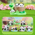Cute panda blind box figurine holding a green Mahjong tile with floral mahjong details - Huahua Daily Life (Set)