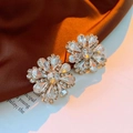 Macro detail of French flower stud earrings featuring crystal petals and a sparkling center - 2# Gold Rhinestone Inlaid Flower (925 Sterling Silver Earring Post)