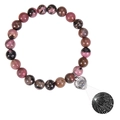 Macro view of pink and black agate bead bracelet with heart-shaped projection stone pendant - Rhodonite Bracelet