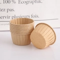 Brown kraft paper muffin cups stacked on white background for baking cupcakes - Natural Kraft Paper