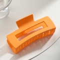Matte orange large square hair claw clip with hollow design on a clean white background - 10.5cm Orange