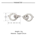 Detail of interlocking copper double rings with roman numerals and pave-set zircons - Roman Numeral Double Ring / Silver