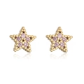 Close-up of 18K gold star stud earrings featuring pink zircon inlays and beaded edges - Pentagram / Pink