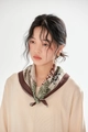 Detail of floral linen square scarf worn as a decorative retro necktie and headband - Dark Coffee Paisley