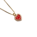 Gold plated heart pendant necklace with red enamel smiley face and sparkling crystals - Red