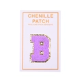 Macro detail of purple chenille letter B patch with golden glitter border and peel stick back - Letter B / Purple