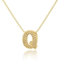 Close-up of golden letter Q pendant with pavé-set crystals on a box chain - Letter Q
