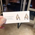 Elegant 18K gold-plated V-shaped geometric stud earrings with sparkling cubic zirconia - Gold
