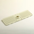 Beige silicone faucet drain rack with grooved design for bathroom sink organization - Foldable + Central Drainage / Off White