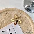 Barrette étoile dorée style Y2K avec un design minimaliste en métal de 3cm - 3cm / Doré