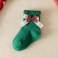 Green knitted Christmas sock with a red plaid bow and festive golden snowflake ribbon - S (1-3 Years) / Green Snowflake Bow