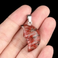 Face engraved crescent moon pendant in red marble stone with silver metal bail - Sesame Stone