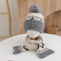 Detailed view of beige and gray knitted kids beanie with pom-pom and matching scarf set - Hat Scarf Set / Gray